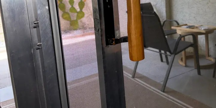 Sliding patio door latch area near the keeper